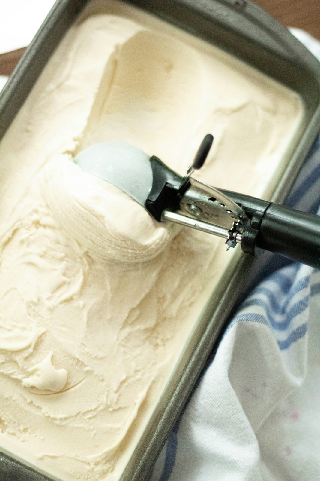 Madagascar vanilla bean ice cream being scooped
